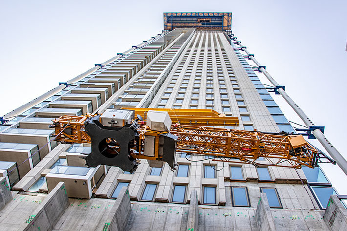 Liebherr fast-erecting crane 34 K at work on the tallest building in the Benelux region